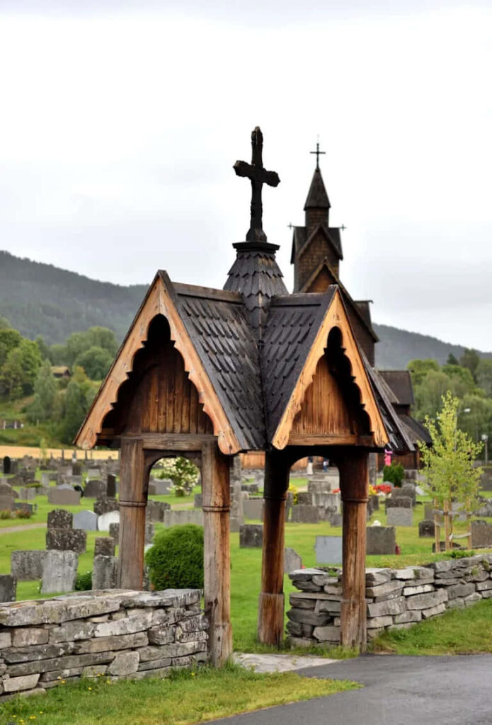 Serene Heddal Stave Church Wallpaper: Intricate Wooden Architecture