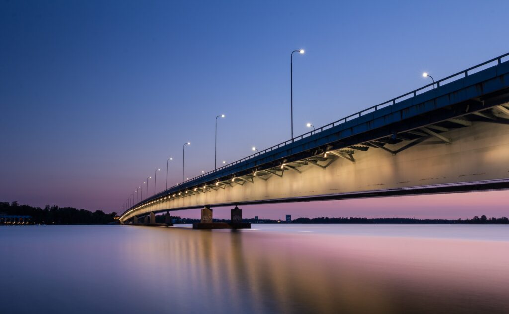 Serene Helsinki Bridge Wallpaper: Tranquil Night View Background
