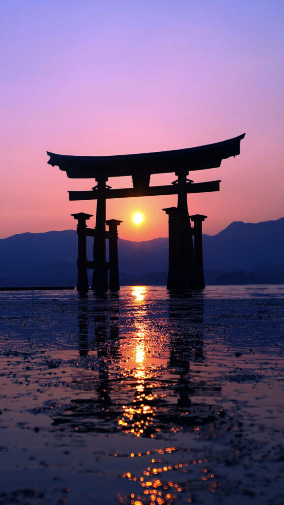 Serene Japanese Torii Gate Sunset Wallpaper for iPhone