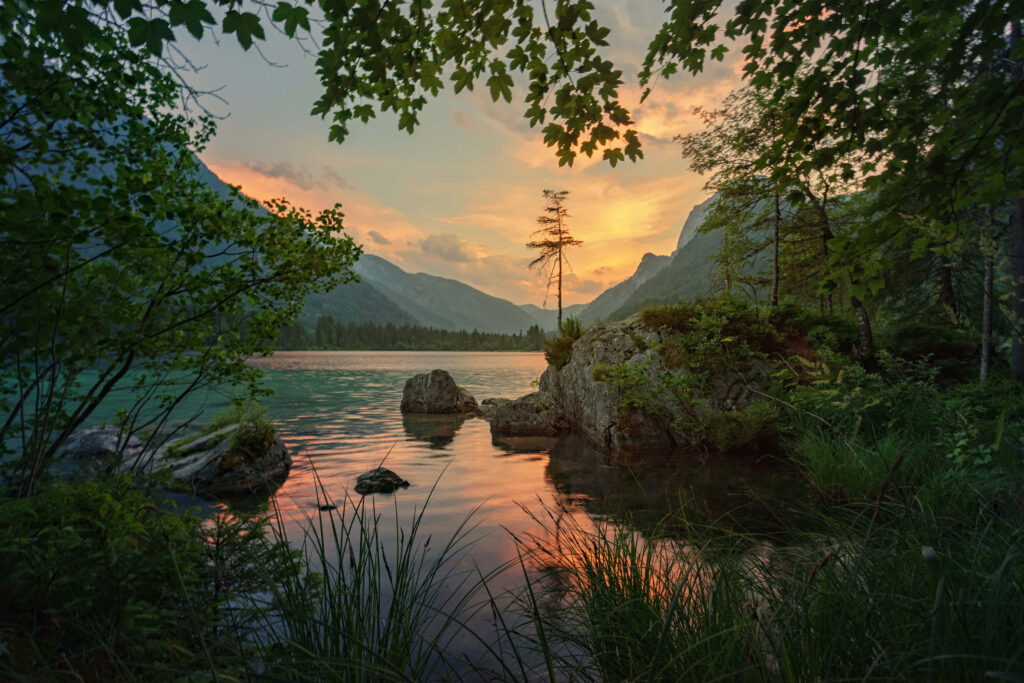 Serene Lakeside Wallpaper: Calm Water & Stunning Mountain Views
