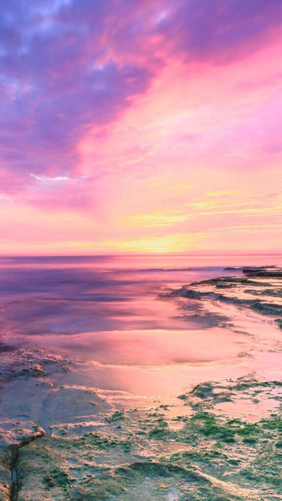 Serene Landscape Wallpaper: Pink Sunset Over Tranquil Waters