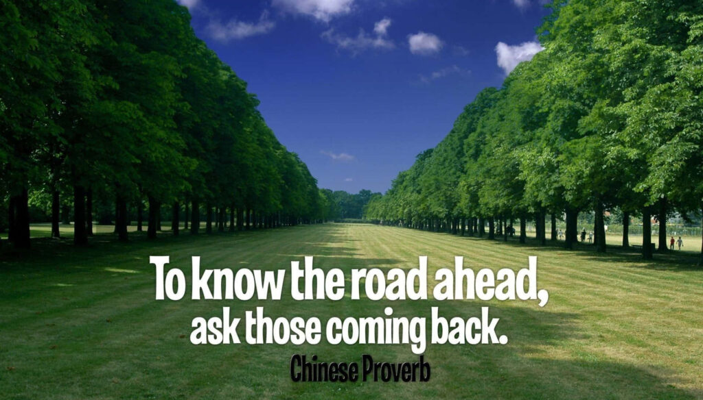 Serene Tree-Lined Path Wallpaper with Inspirational Chinese Proverb