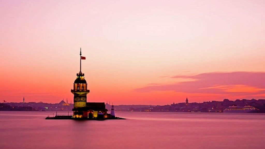 Tranquil Lighthouse Sunset Wallpaper - Pink & Orange Sky Background