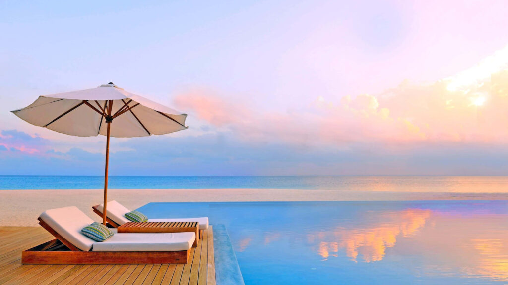 Serene Maldives Beach Wallpaper: Tranquil Ocean & Sunset Escape