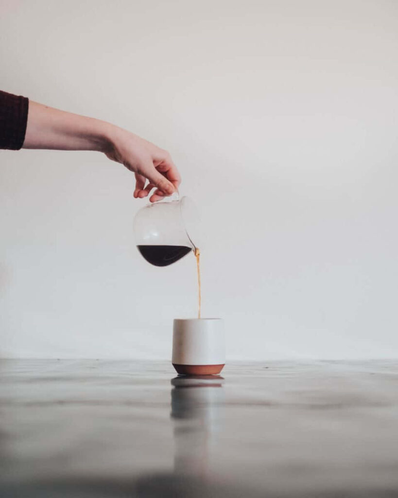 Serene Minimalist Coffee Wallpaper: Calm Scene with Glass Carafe