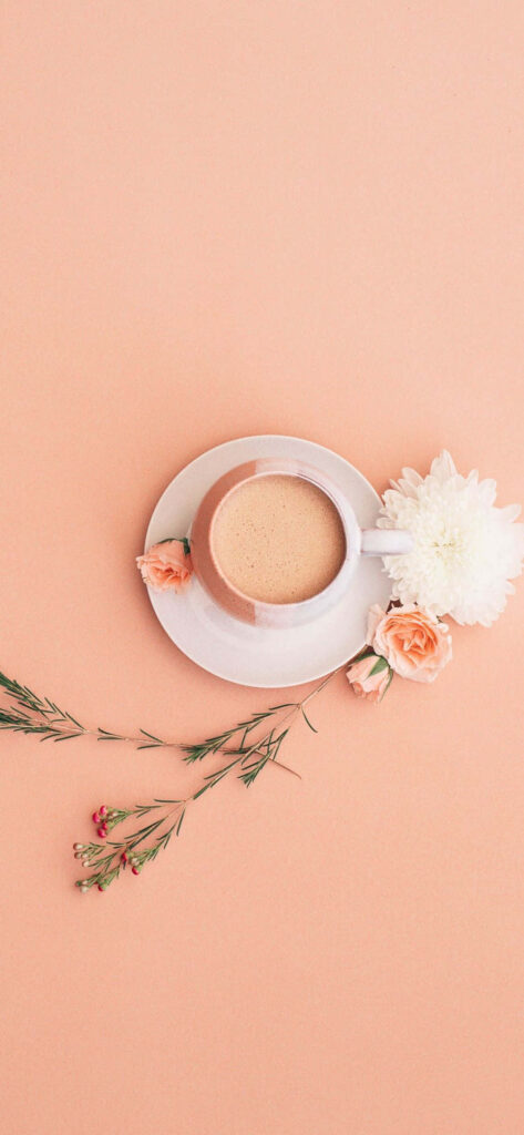 Serene Minimalist Flower Wallpaper with Coffee on Peach Background