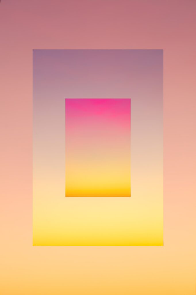 Minimalist Abstract Wallpaper: Serene Pink to Yellow Gradient