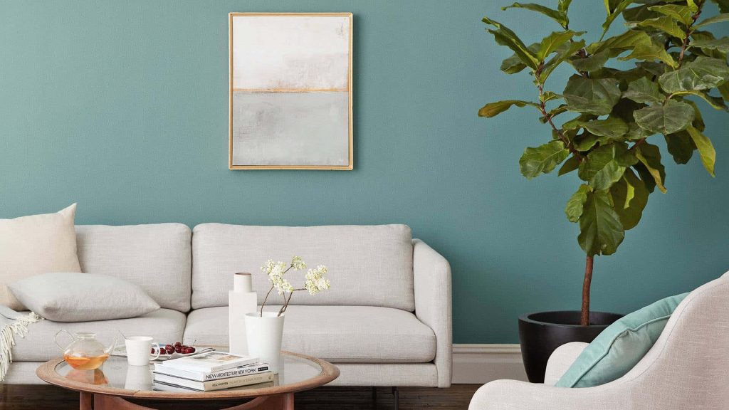 Modern Zoom background with teal wall sofa abstract art fiddle-leaf fig tree minimalist decor Wallpaper
