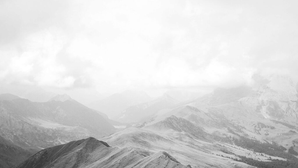 Majestic Monochrome Landscape: Serene Rolling Hills & Dramatic Sky Wallpaper