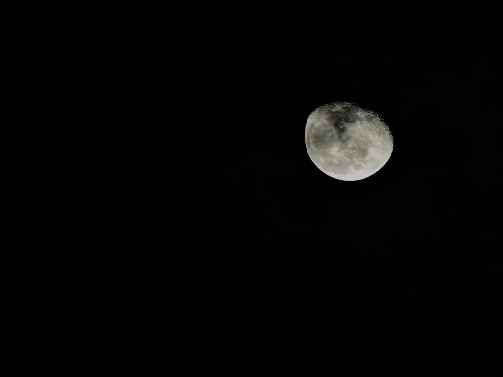 Serene Moon Wallpaper: Minimalist Space-Themed Night Sky Background