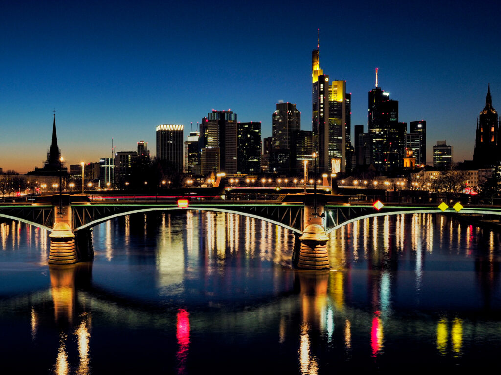 Stunning City Night Wallpaper with Illuminated Bridge Reflection
