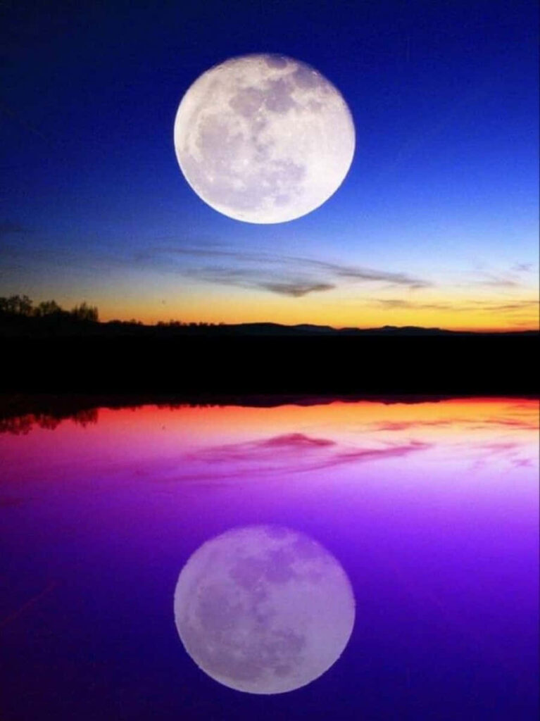 Serene Night Scene: Glowing Full Moon Reflected on Colorful Water Wallpaper
