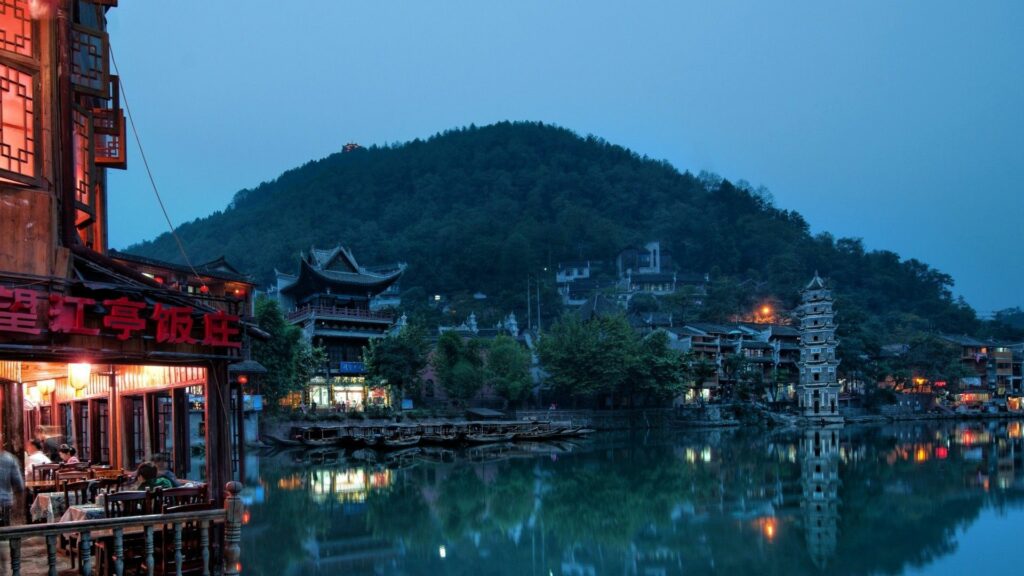 Serene Night Scene Wallpaper: Traditional Chinese Architecture & Nature