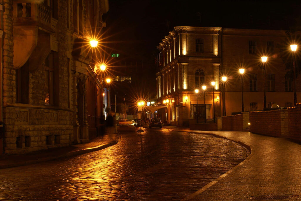 Charming Historic City Street at Night - Cobblestone Wallpaper