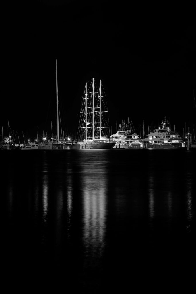 Serene Black-and-White Port Night Scene Wallpaper for Elegant Background