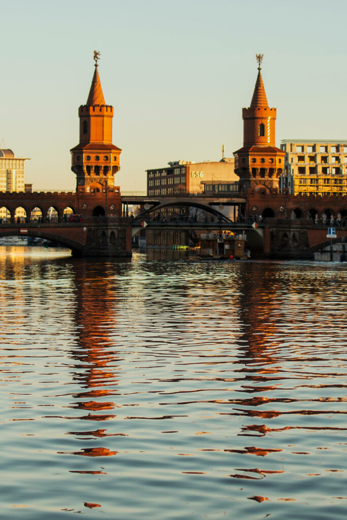 Serene Wallpaper of Berlin's Oberbaum Bridge Reflecting on Water
