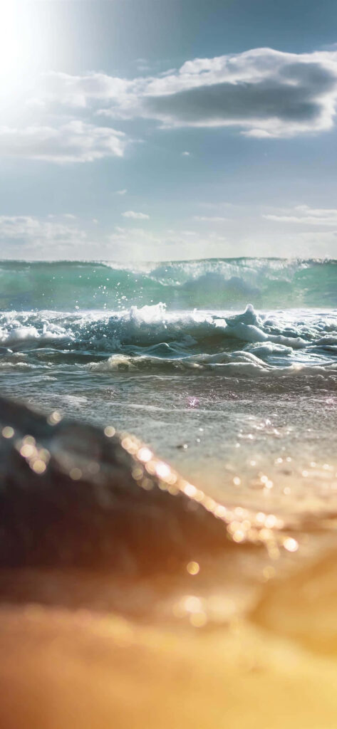 Serene Ocean Wave Wallpaper: Peaceful Beach Scene Background