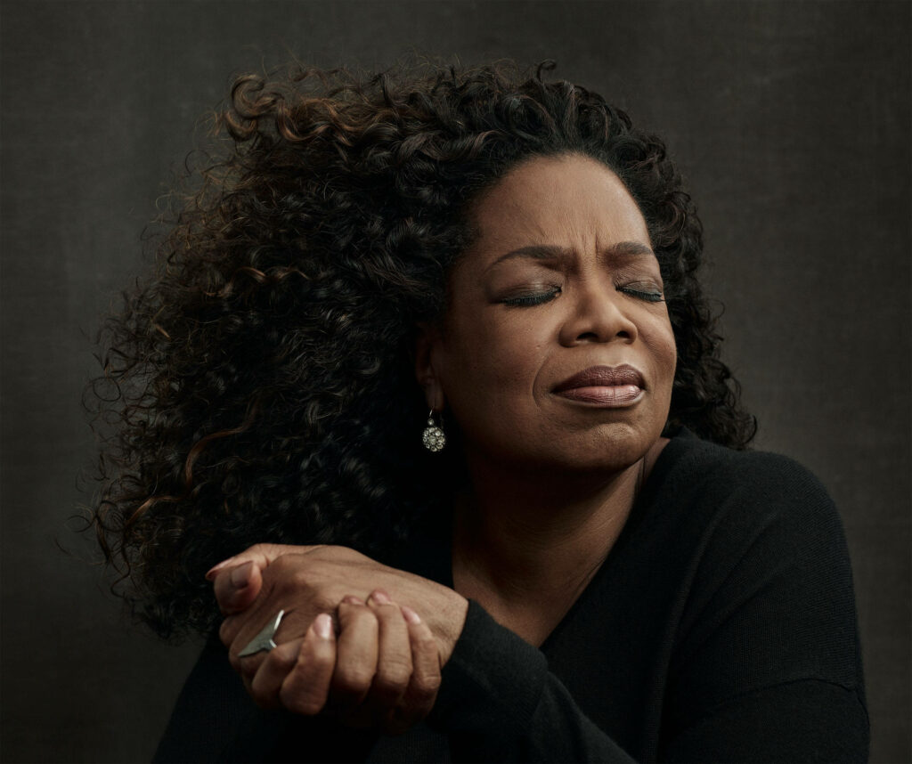 Serene Oprah Winfrey Wallpaper: Introspective Reflection Background