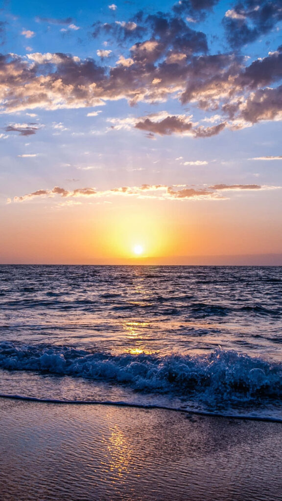 Serene Beach Sunset Wallpaper: Tranquil Ocean Paradise Background