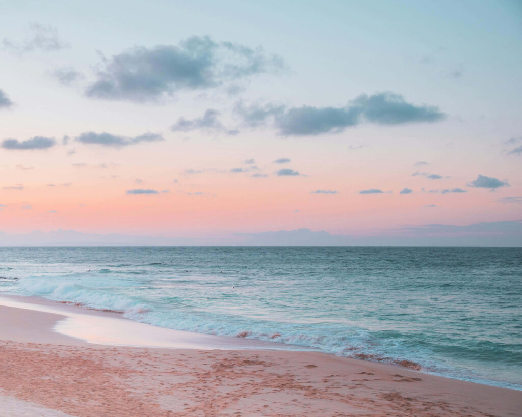 Tranquil Beach Wallpaper: Pastel Sunset Serenity Background