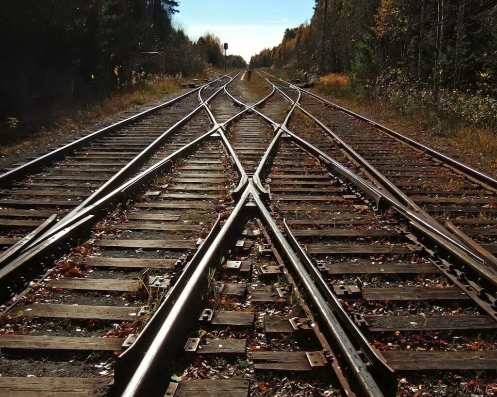 Vibrant Railroad Intersection Wallpaper: Serene Natural Landscape