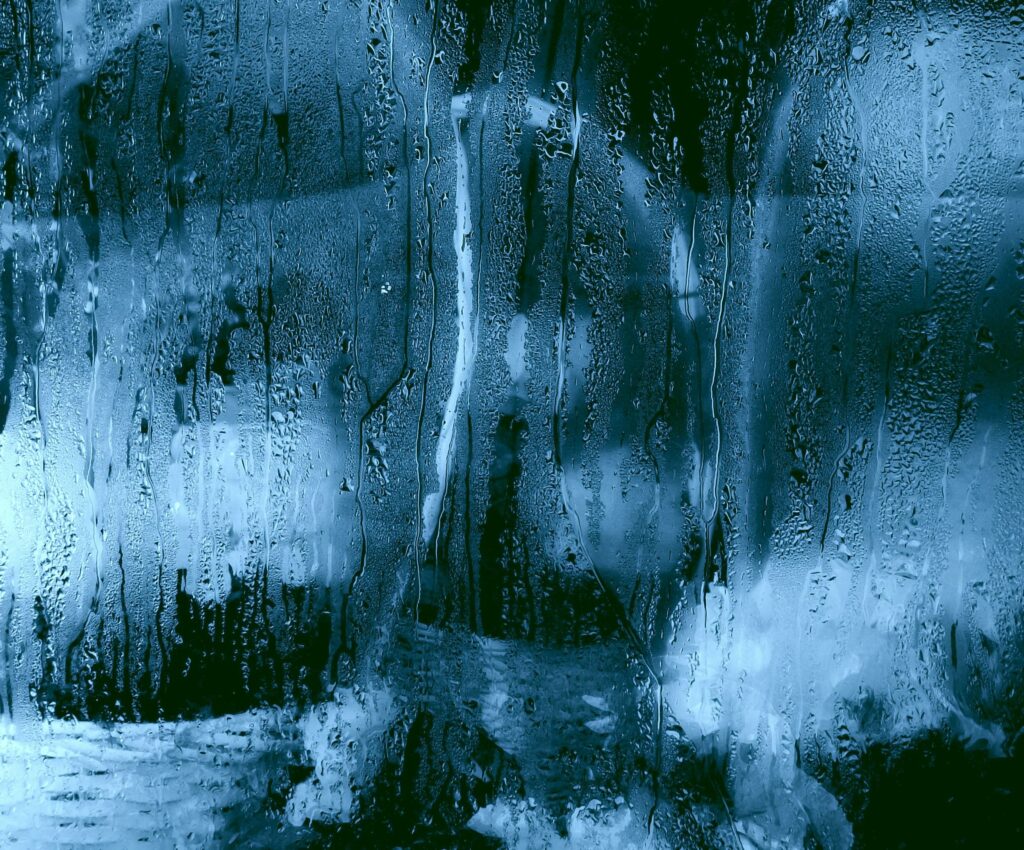 Serene Rain Droplets Wallpaper: Intricate Patterns on Glass