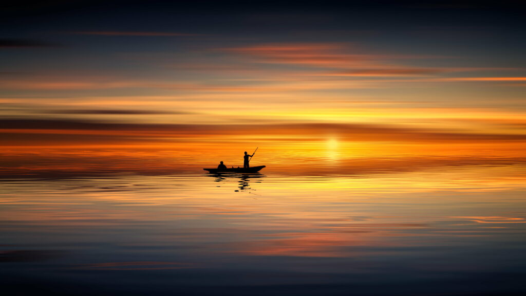 Serenity at Dusk: Captivating Boat on Ocean during Enchanting Sunset - HD Wallpaper Background Photo