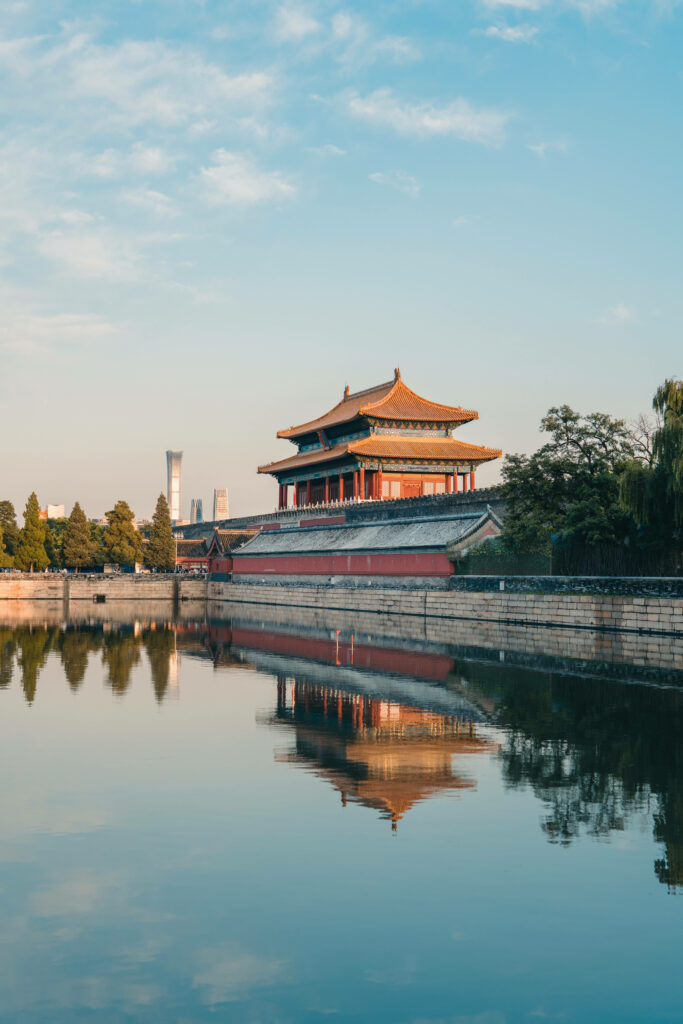 Serene River View of Forbidden City - Majestic Architecture Wallpaper