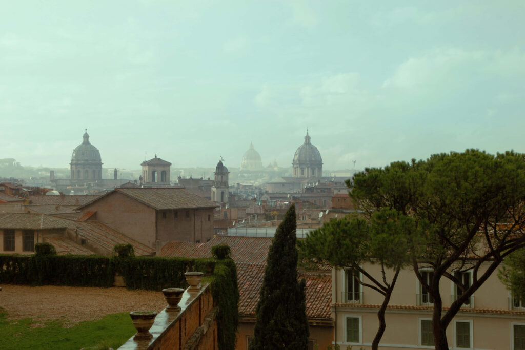 Serene Rome Wallpaper: Iconic Architecture & Lush Greenery View