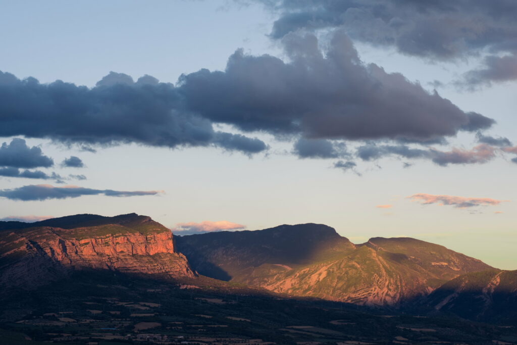 Serene HD Mountain Landscape Wallpaper with Dramatic Sky