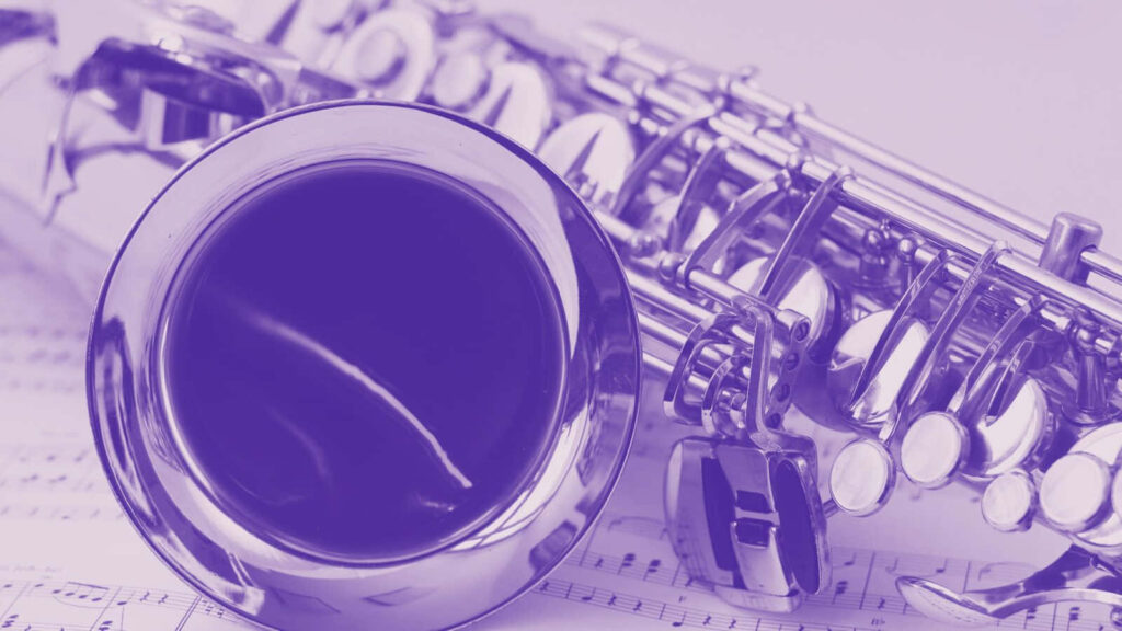 Elegant Saxophone Wallpaper: Serene Purple Musical Notes Background