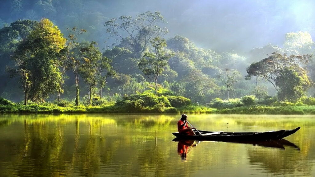 Tranquil Waters: Exploring Nature's Playground - A Picturesque Canoe Trip Amidst the Vast Ocean Wallpaper