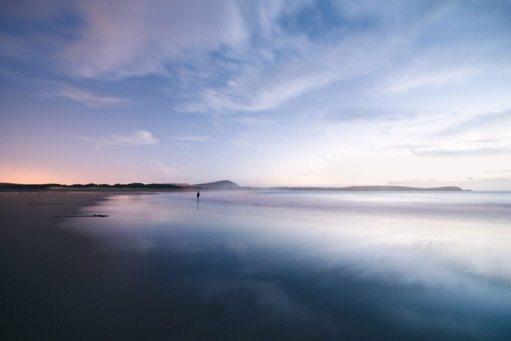 Serene Seascape HD Wallpaper: Calm Waters & Tranquil Sky Reflection