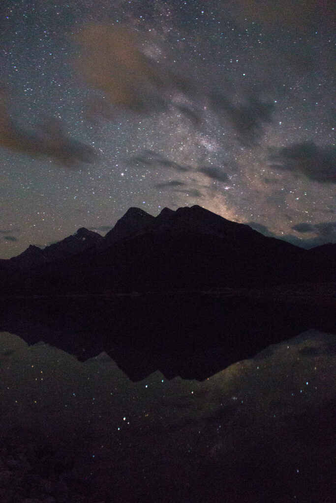 Serene Reflection: Majestic Mountain against a Sea's Canvas Wallpaper