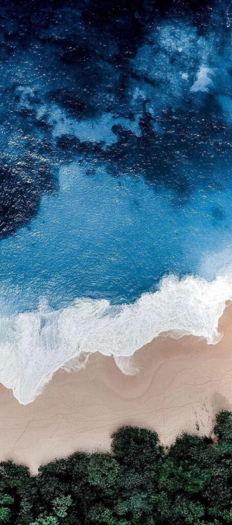 Seaside Serenity: A Breathtaking Aerial Display of Sun, Sand, and Sea - Summer iPhone Wallpaper