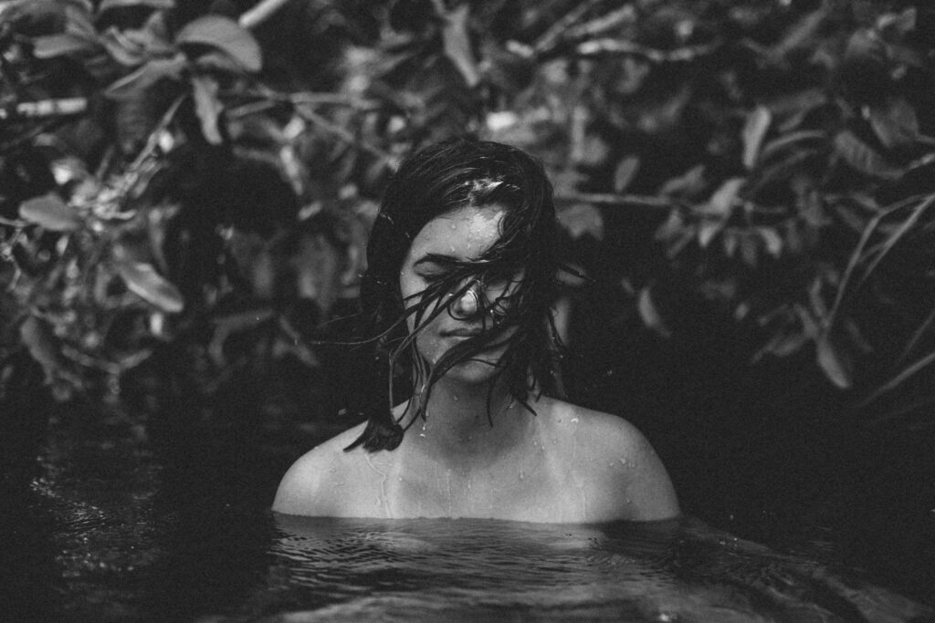 Naturally Captivating: Marina Dizza's Breathtaking Nude Model Pose by the River Wallpaper