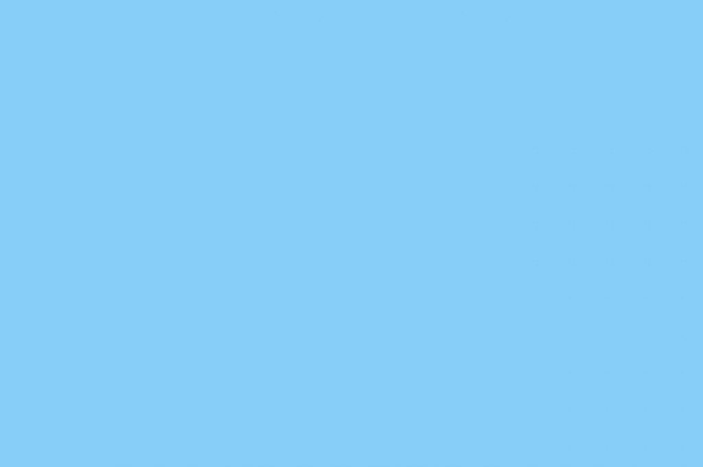 Serenely Scenic: Pastel Blue Skies Painting a Tranquil QHD Wallpaper