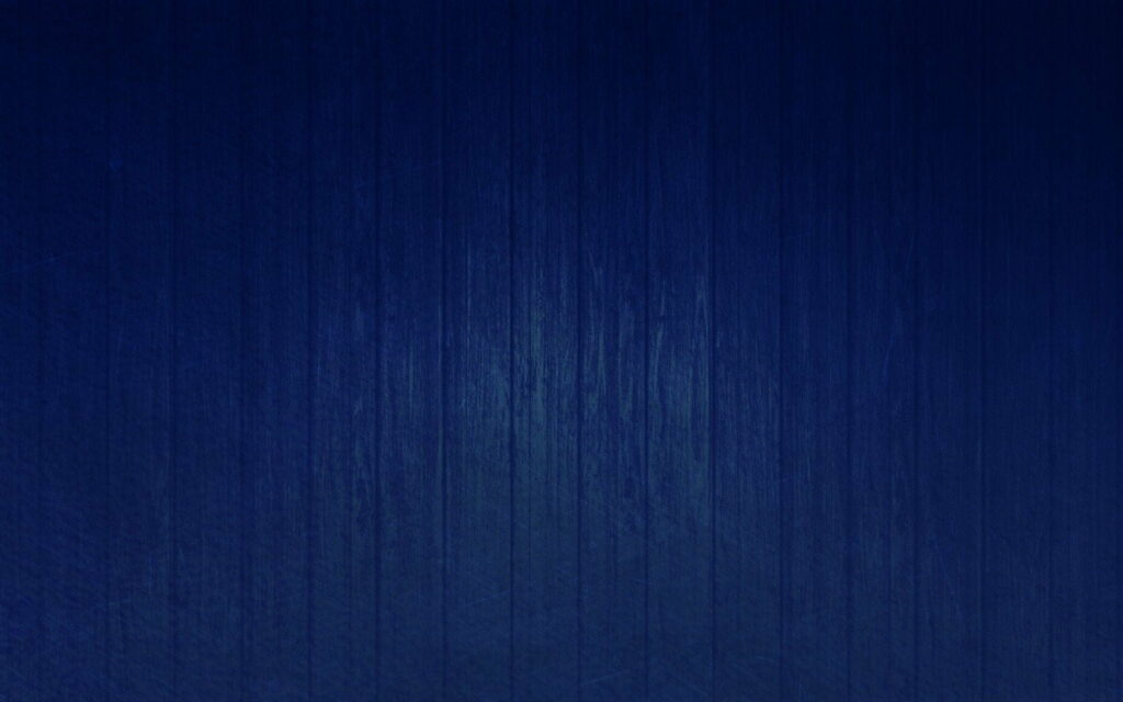 Oceanic Elegance: A Captivating High-Definition Navy Blue Wood Texture Wallpaper