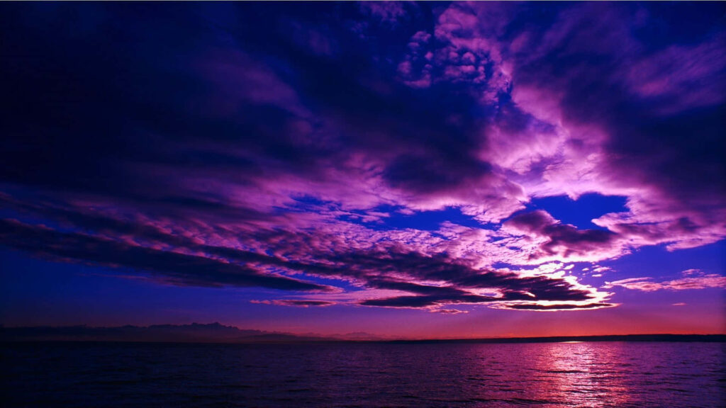 Captivating Pink Glow: Mesmerizing Beach Sunset in High Resolution Wallpaper