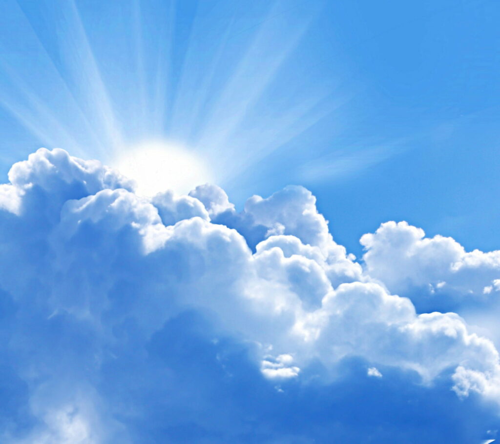 Serene HD Wallpaper: Radiant Sky & Fluffy Clouds Background