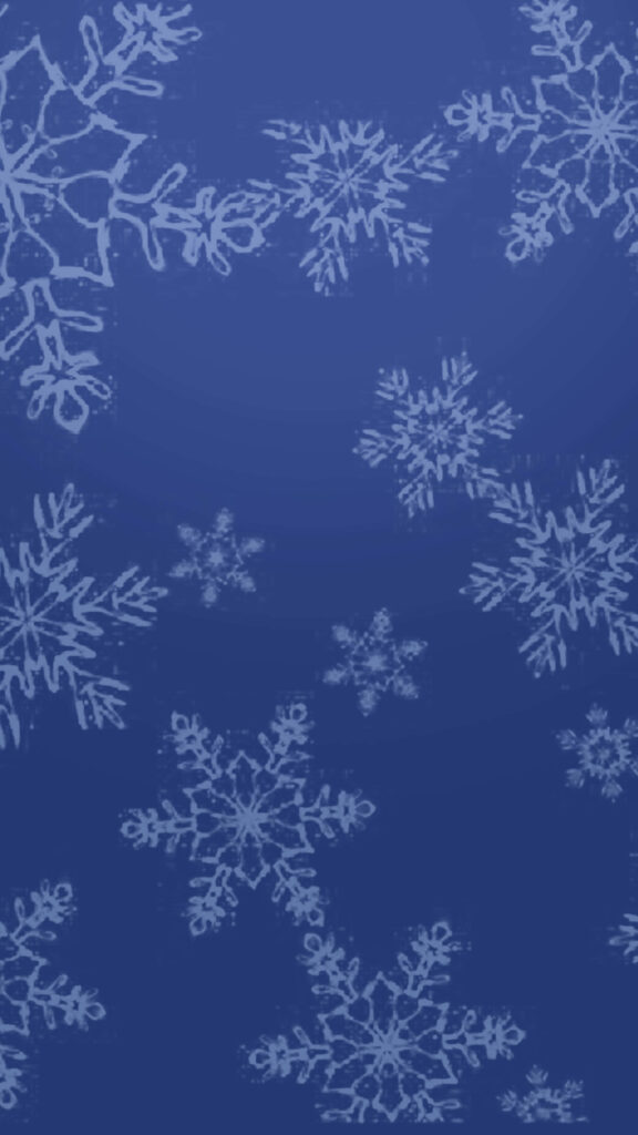 Delicate Snowflakes on Blue Background for a Serene Winter Scene Wallpaper
