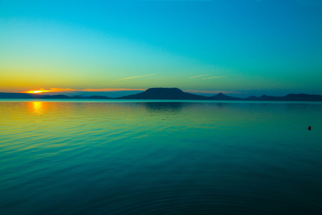 Tranquil Waters: A Serene Escape - Captivating 4K Nature Wallpaper of a Calm and Beautiful Lake