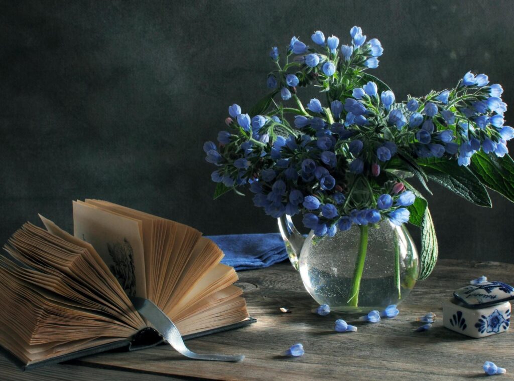 Serene Still Life Wallpaper: Blue Flowers & Rustic Decor Background