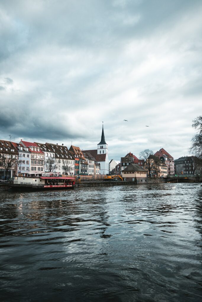 Serene Strasbourg Riverside Wallpaper - Picturesque Cityscape Design