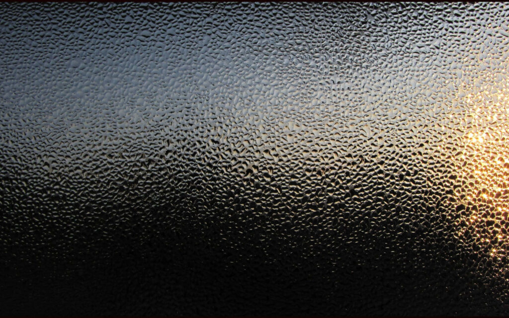 Serene Sunrise Through Textured Glass - Abstract Light Wallpaper