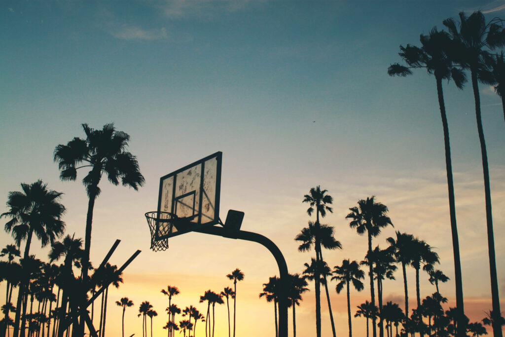 Tranquil Sunset Basketball Wallpaper: Palm Trees & Tropical Vibes