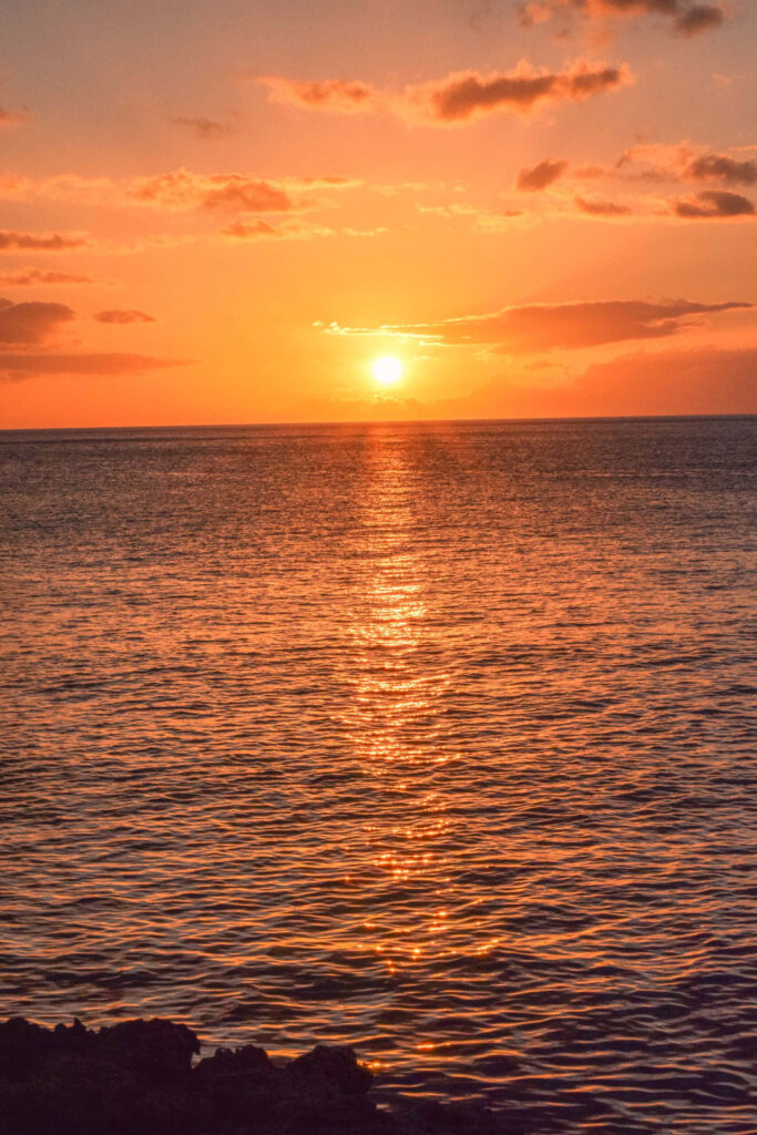 Serene Sunset Beach Wallpaper - Tranquil Waters & Warm Glow
