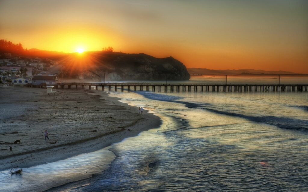 Serene Santa Monica Sunset Wallpaper: Beach, Waves & Bridge