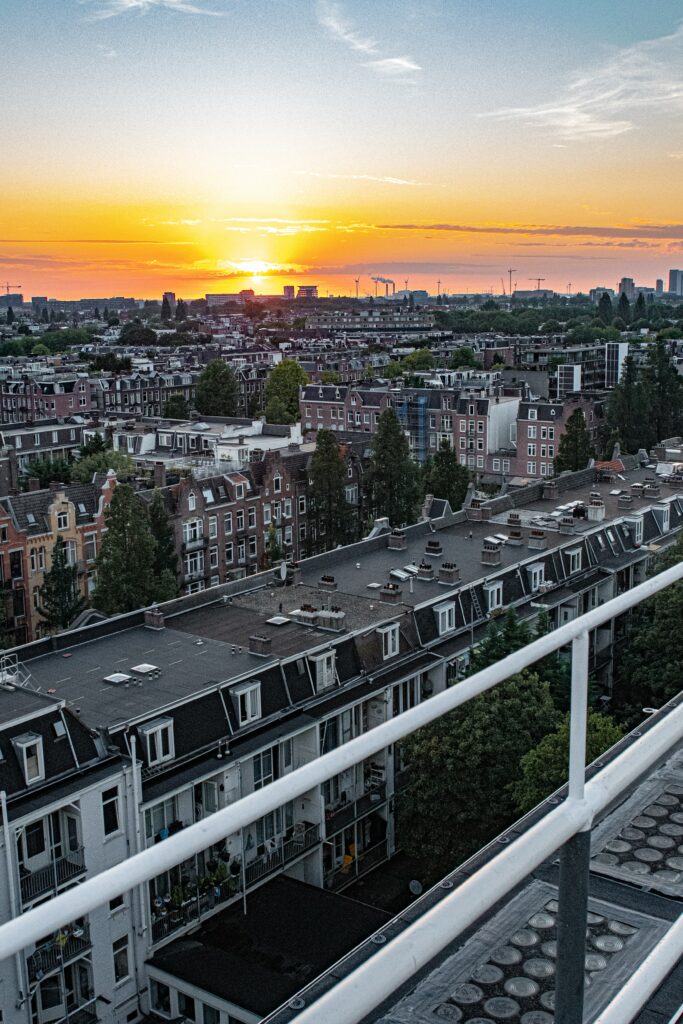 Charming Sunset Cityscape Wallpaper: Serene Urban Architecture