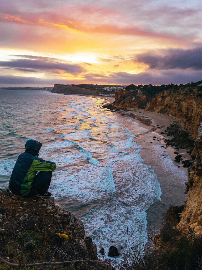 Serene Coastal Sunset Wallpaper for iPhone: Inspiring Cliff View